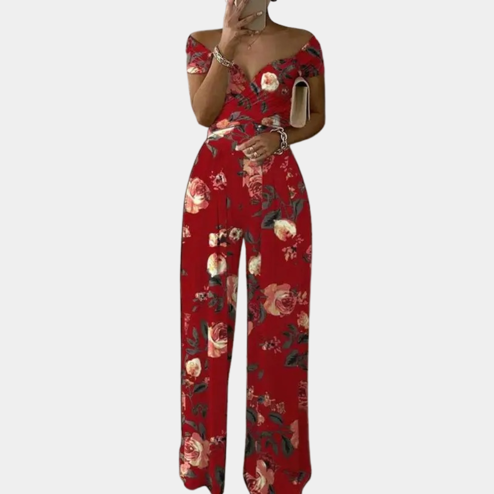 Dámský jumpsuit s květinovým vzorem a off-shoulder designem