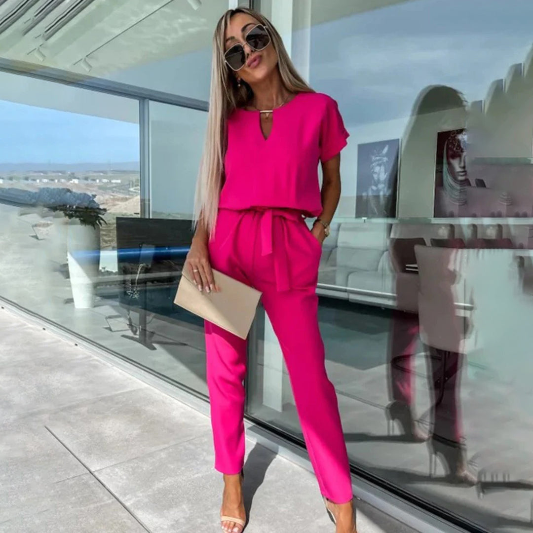 Dámský jumpsuit s v-halsline a elastickým pasem