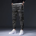 Streetwear kalhoty s elastickým pasem a kapsami pro muže