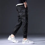 Streetwear kalhoty s elastickým pasem a kapsami pro muže