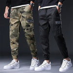 Streetwear kalhoty s elastickým pasem a kapsami pro muže